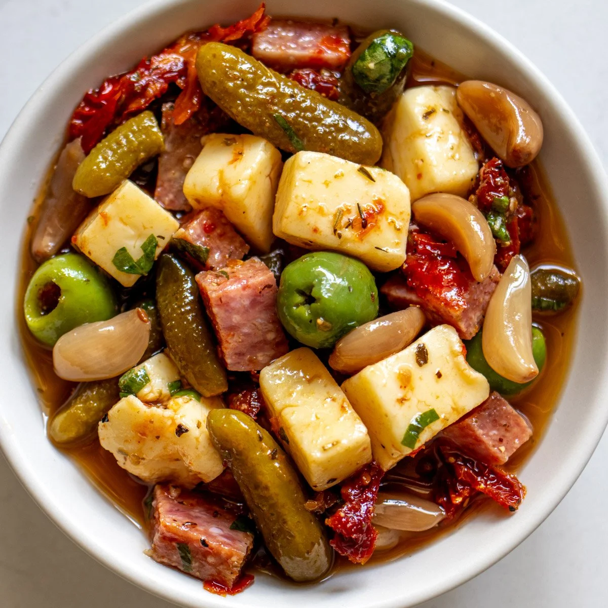 Marinated Cheese with Salami and Pickles